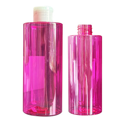 Op maat geleverde rode heldere PET-plastic lotionfles met drukplaatkap en 300/400/500 ml capaciteit