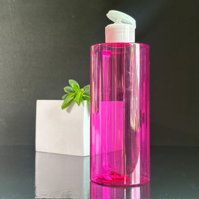 Op maat geleverde rode heldere PET-plastic lotionfles met drukplaatkap en 300/400/500 ml capaciteit